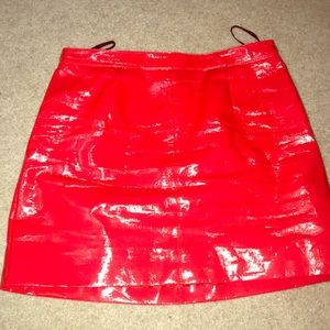 Patent leather skirt.